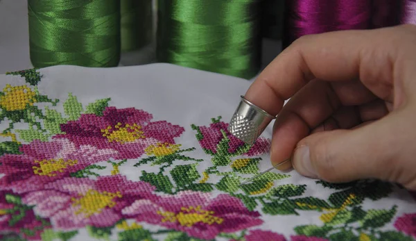 depositphotos 338499388 stock photo process cross stitch flower ornament
